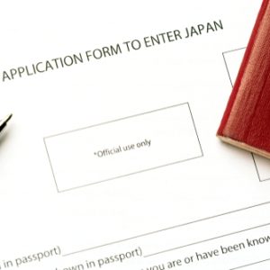 Pen And Passport On Blank Japan Visa Application form Tourism