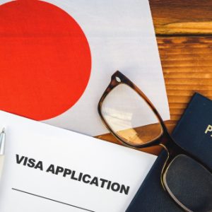 Visa application, passport, eye glass, japan flag