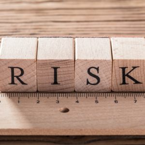 Risk,Word,On,Blocks,Arranged,Behind,The,Ruler,On,Wooden