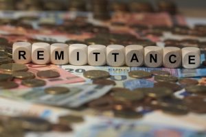 Remittance – Cube With Letters  Money Sector Terms – Sign