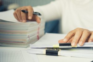 Auditor,Businesswoman,Checking,Unfinished,Document,Legal,Prepare,Paperwork,Or,Report